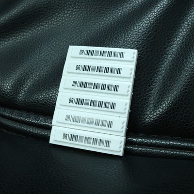 58KHz EAS AM Soft Security Tags Anti Metal Shield 45 X 11 X 7mm Bar Code