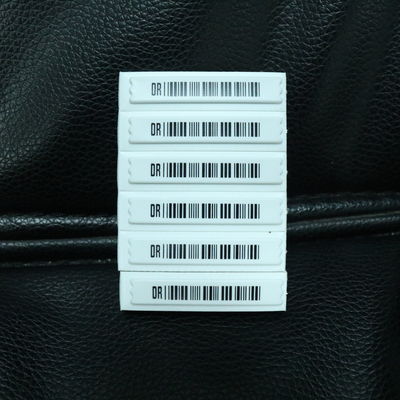 58KHz EAS AM Soft Security Tags Anti Metal Shield 45 X 11 X 7mm Bar Code