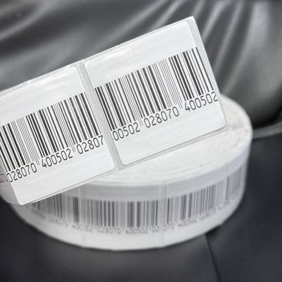 White EAS 8.2MHz Security RF Soft Label 50 X 50mm Coated Paper With Bar Code