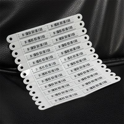 AM Security Soft Label EAS 58KHz 60 X 11 X 2mm With String Bar Code